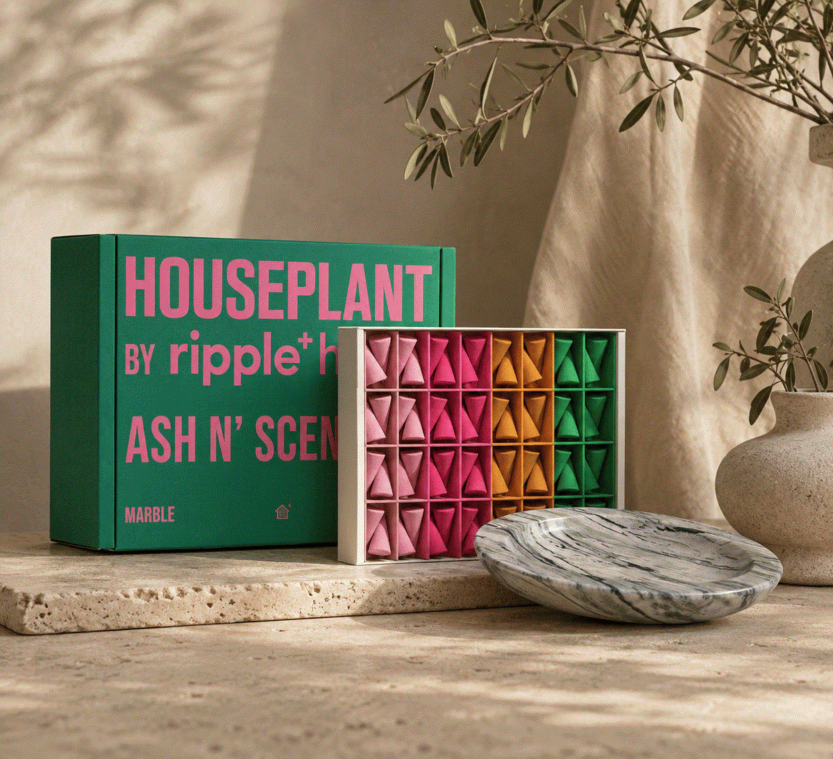 Houseplant by ripple⁺ incense set with green and pink packaging, colorful incense droplets and a veined marble burner