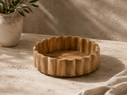 Scalloped Mango Wood Bowl in warm natural brown, with visible wood grain and a deep, fluted scalloped rim
