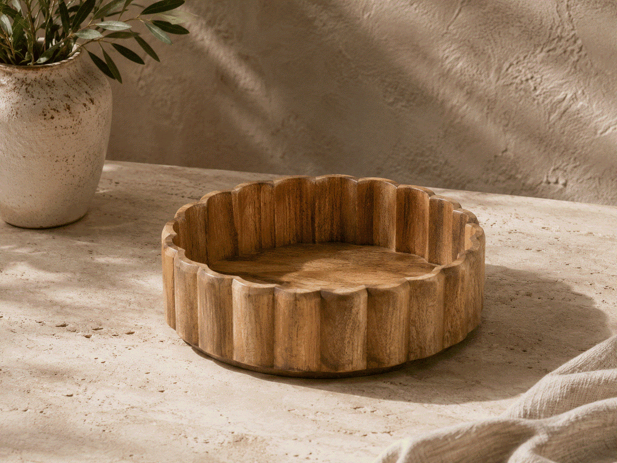 Scalloped Mango Wood Bowl in warm natural brown, with visible wood grain and a deep, fluted scalloped rim
