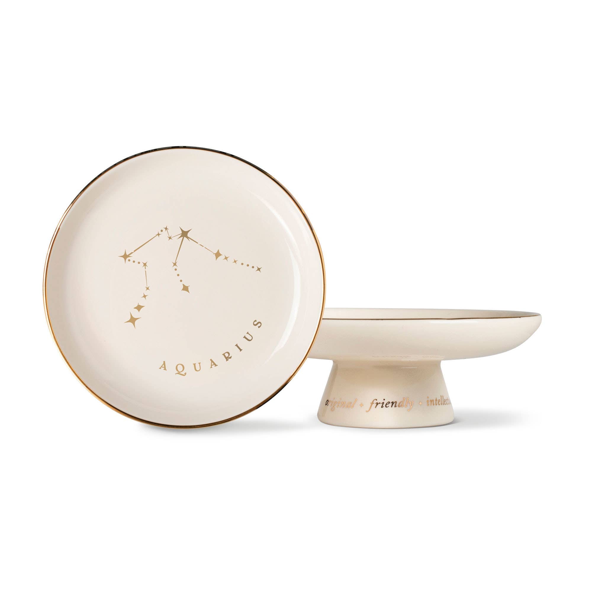 The Rooted Home Aquarius zodiac pedestal tray in stoneware with gold foil constellation and personality traits
