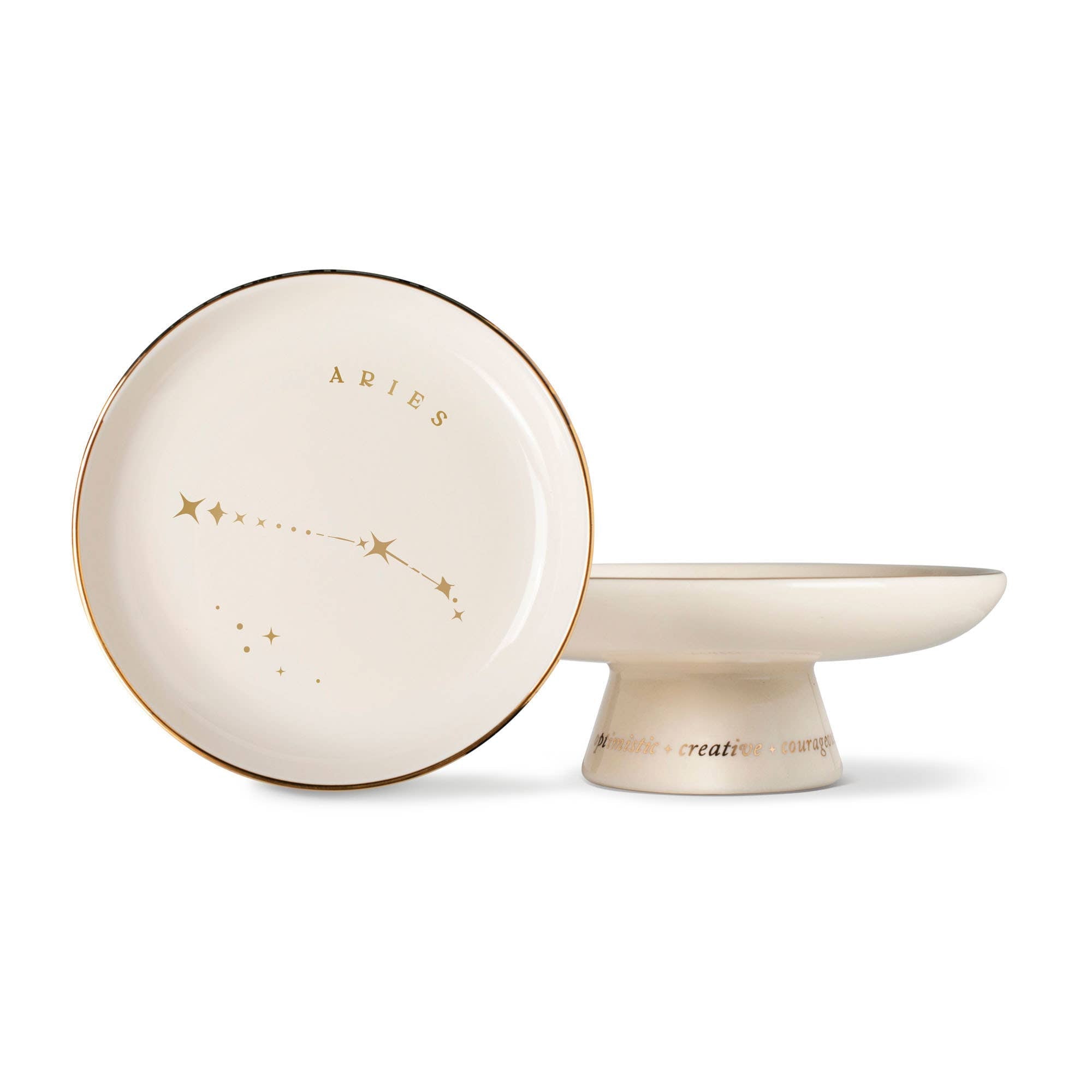 The Rooted Home Aries Zodiac Pedestal Tray in cream stoneware with metallic gold foil constellation and text details.