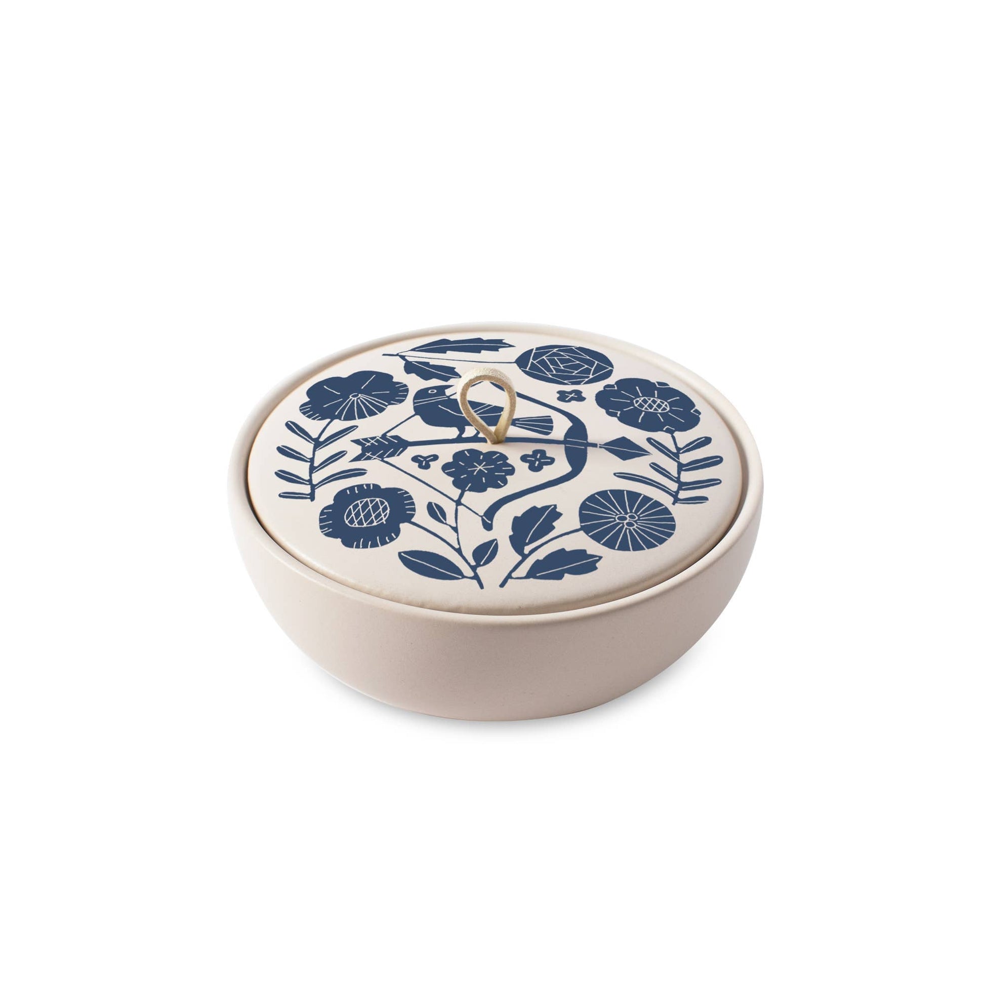 The Rooted Home ceramic zodiac trinket box with a matte finish, blue floral lid design, and faux suede loop handle.