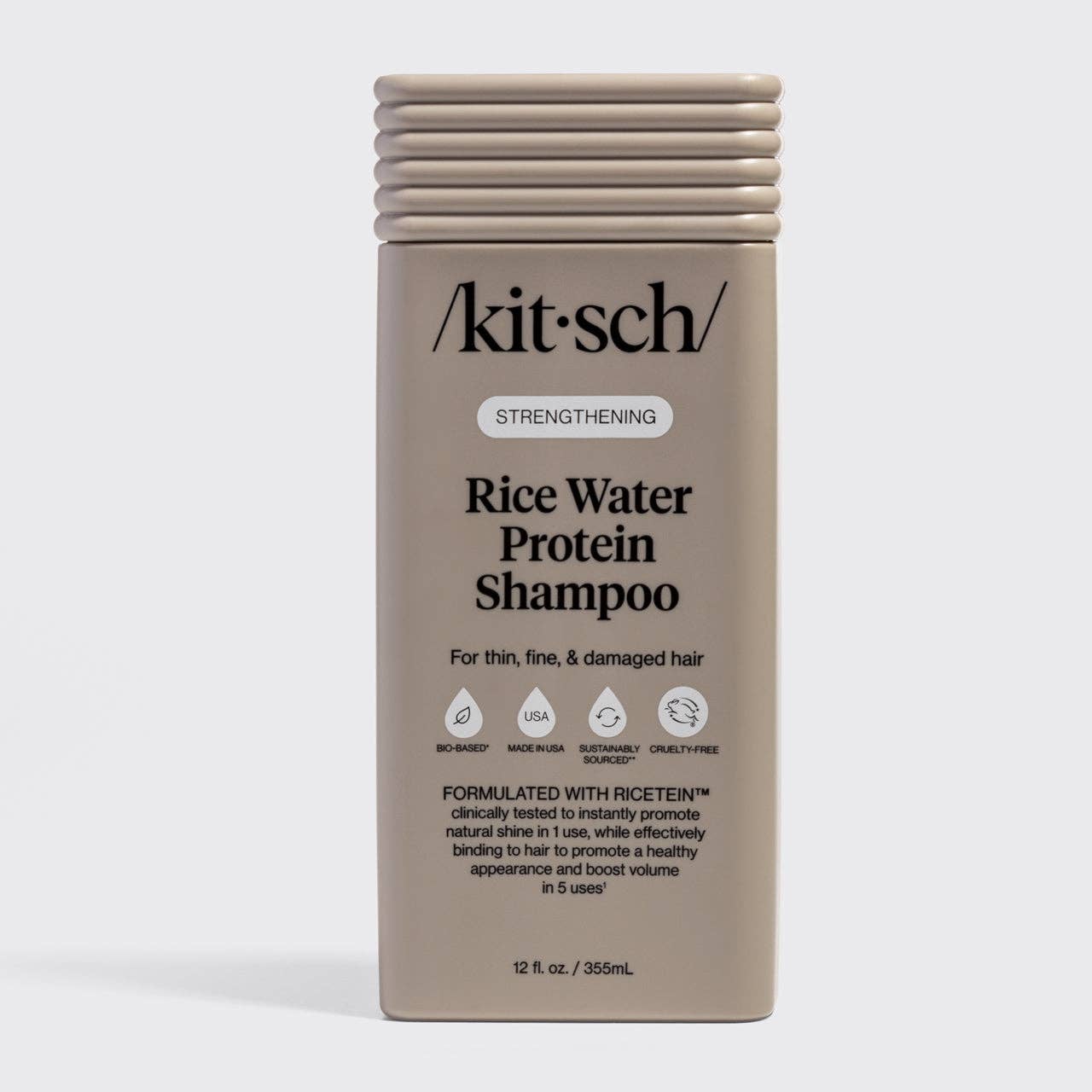 The Rooted Home Kitsch Strengthening Rice Water Protein Shampoo bottle for thin, fine, and damaged hair.