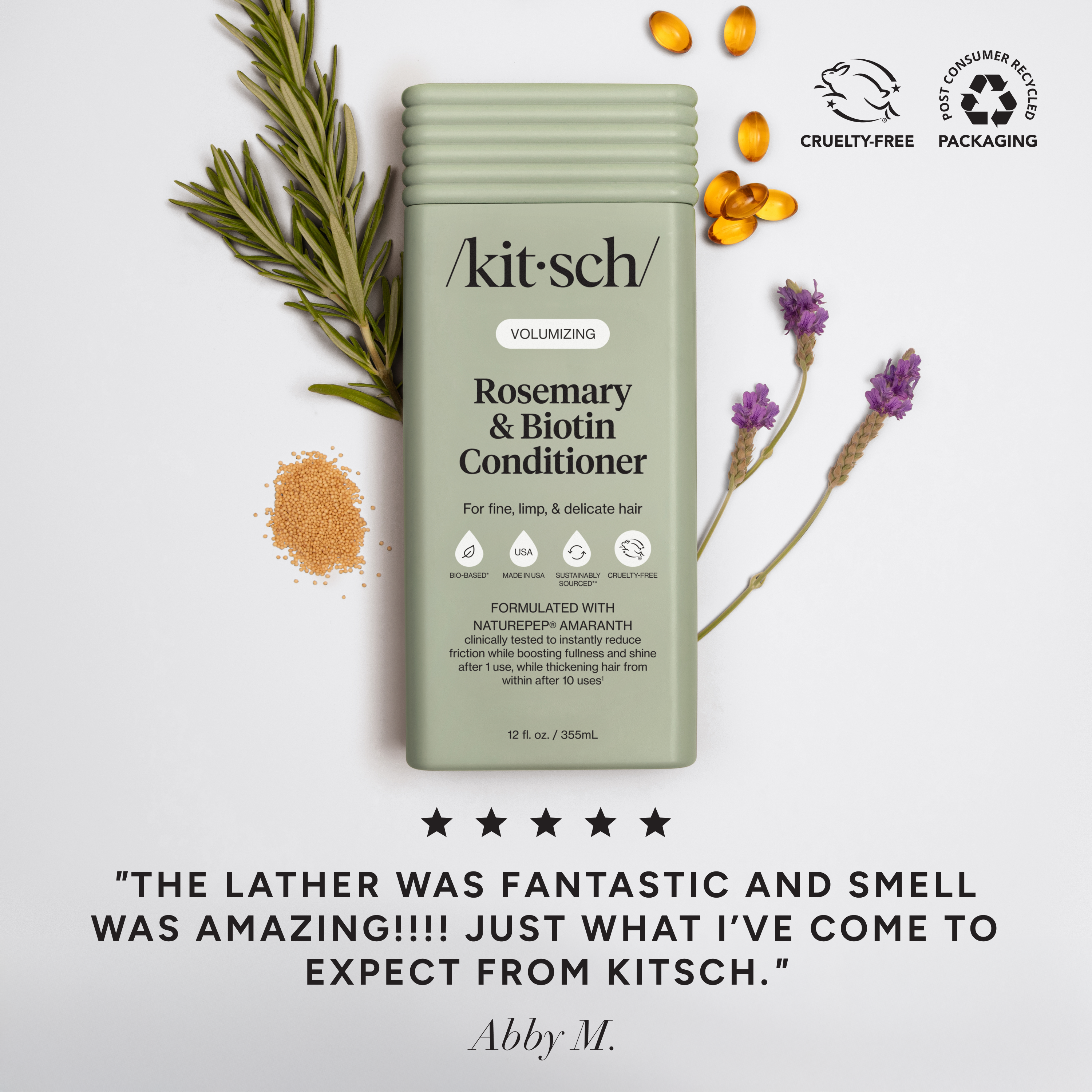 The Rooted Home Kitsch Volumizing Rosemary & Biotin Conditioner bottle with rosemary sprigs and lavender on white.
