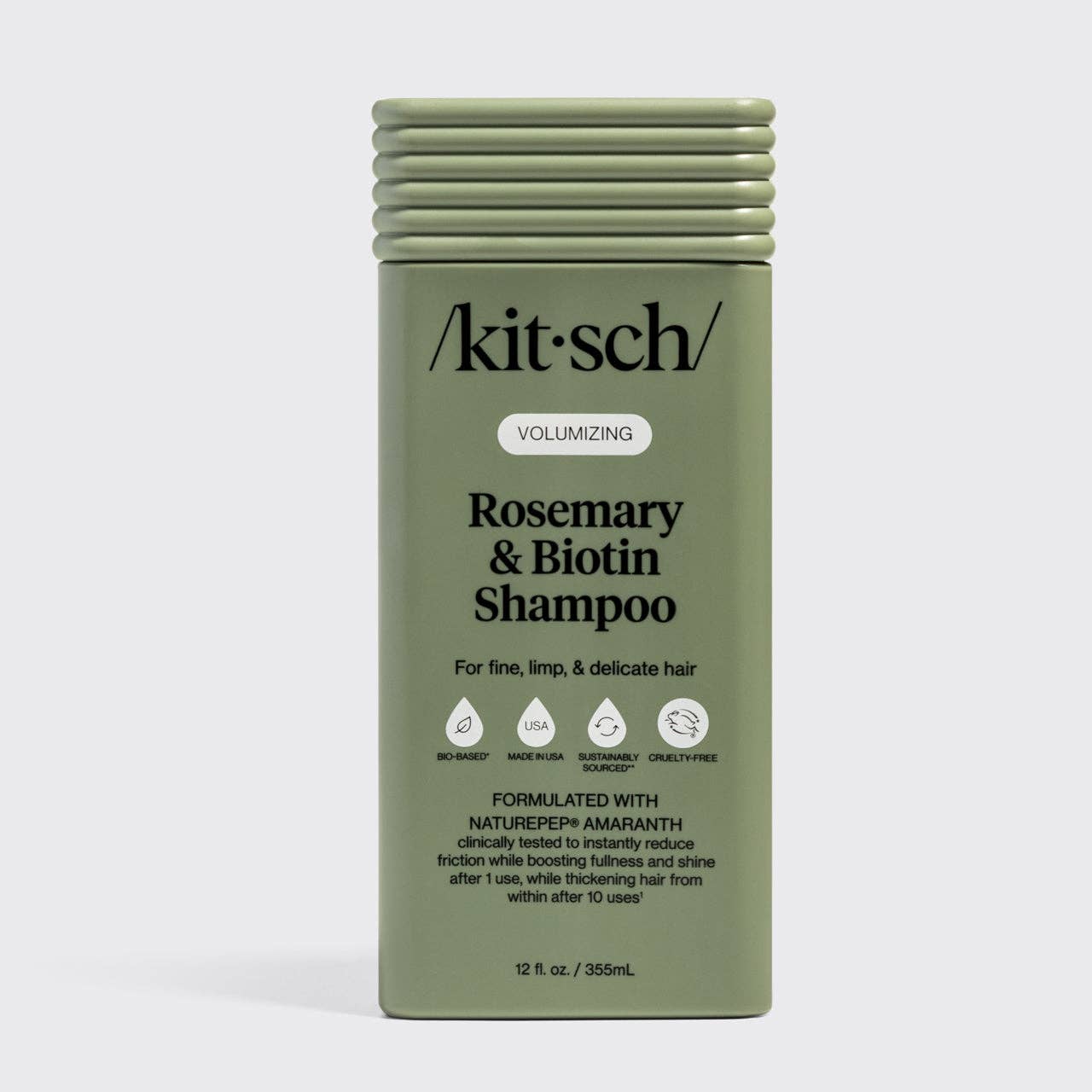 The Rooted Home Kitsch Volumizing Rosemary & Biotin Shampoo in a sage green bottle for fine, delicate hair.