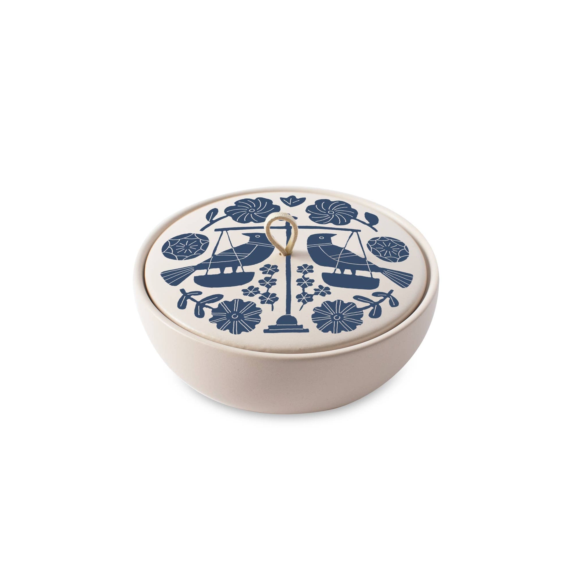 The Rooted Home ceramic trinket box with Libra zodiac design, matte finish, and a faux suede loop handle.