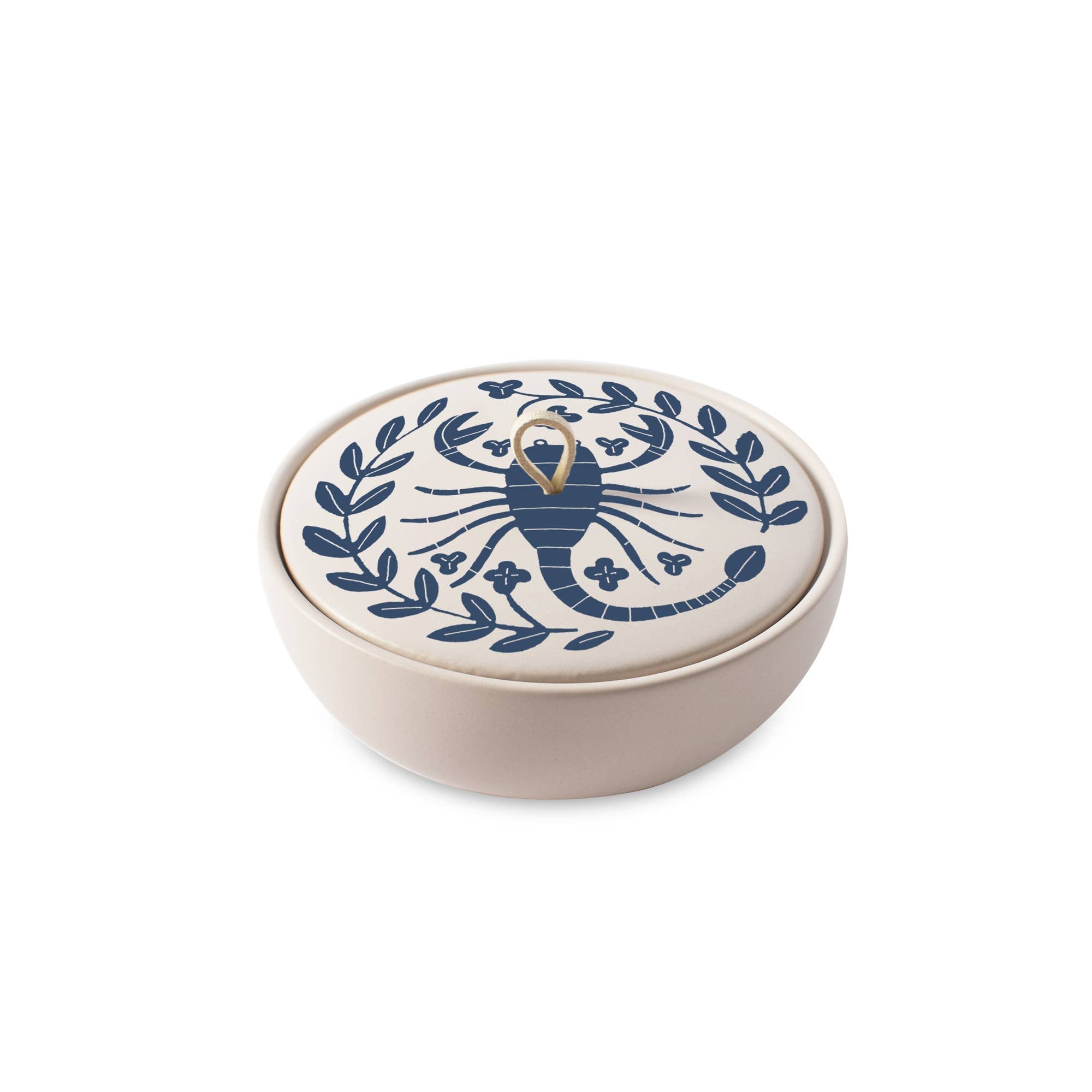 The Rooted Home ceramic trinket box with a matte finish, featuring a Scorpio zodiac design and faux suede loop handle.