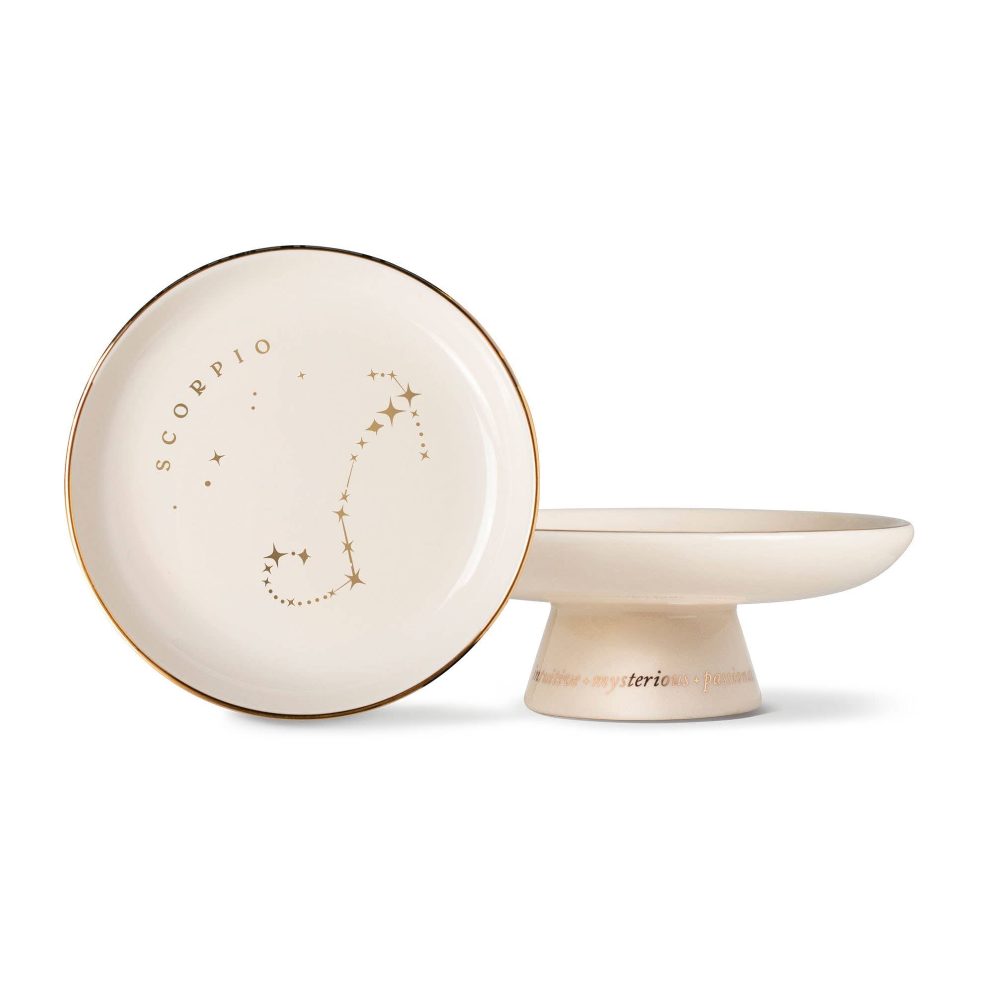 The Rooted Home Zodiac Pedestal Tray in cream stoneware with gold foil Scorpio symbol and personality traits