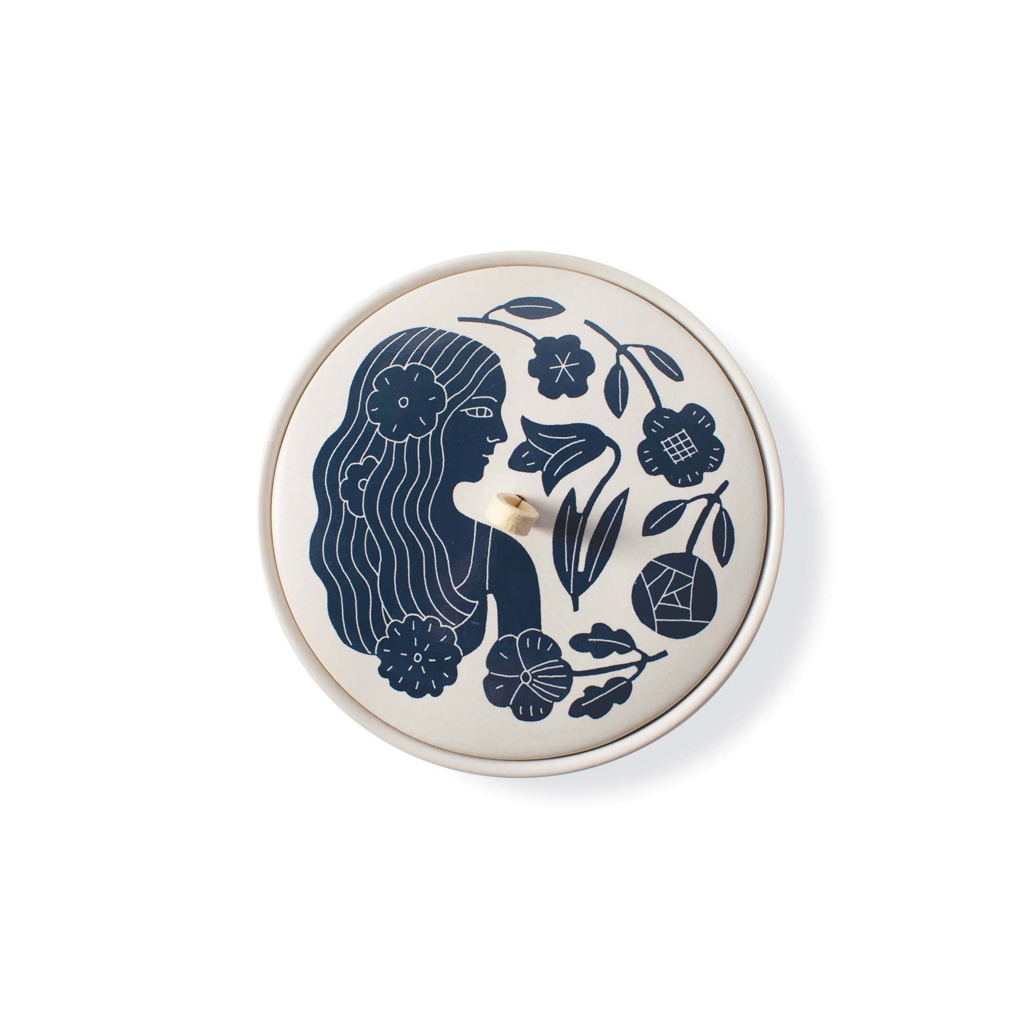 The Rooted Home ceramic trinket box with a matte finish, featuring a blue floral illustration and suede loop handle.