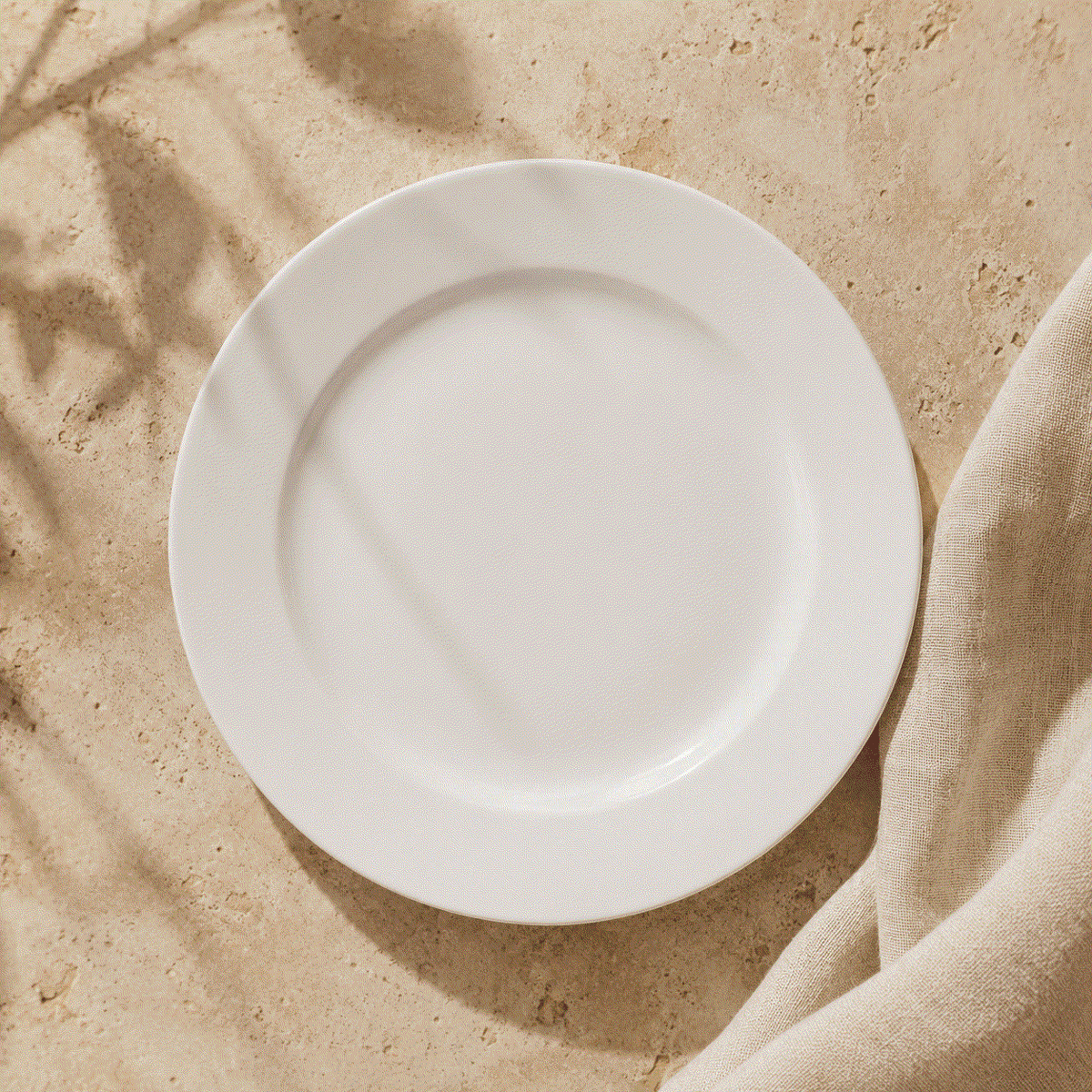 White Rimmed Dinner Plate in smooth white ceramic with a broad raised rim and clean, simple round design