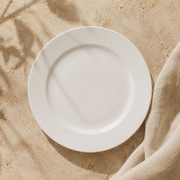 White Rimmed Dinner Plate in smooth white ceramic with a broad raised rim and clean, simple round design